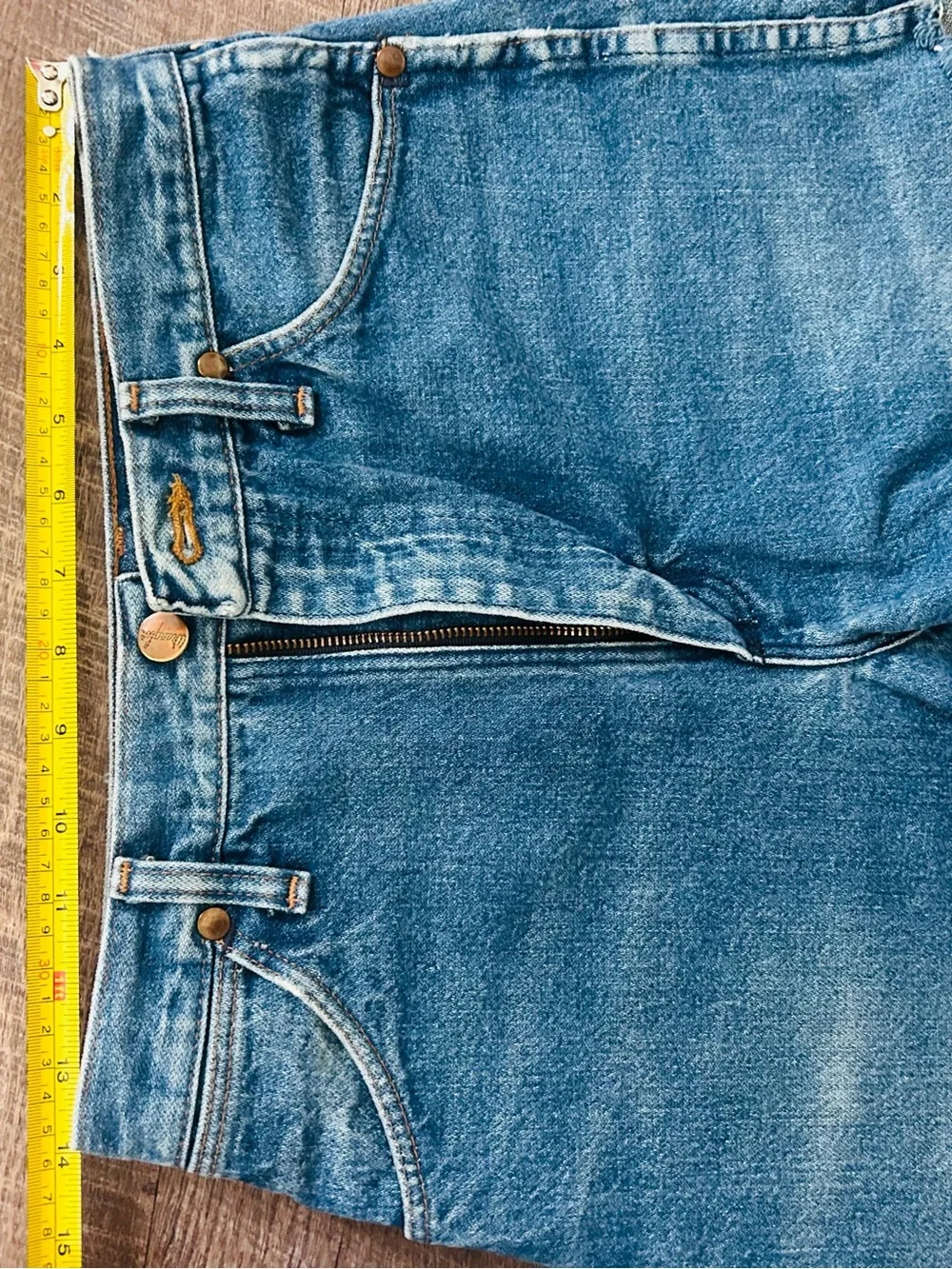 pair of vintage Wrangler high-rise cutoff denim shorts